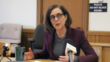 Oregon Gov. Kate Brown speaks to reporters Friday, Jan. 17, 2020 at the Capitol in Salem, Oregon