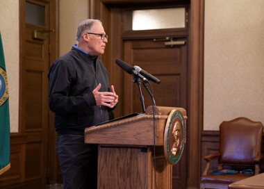 Jay Inslee at a podium