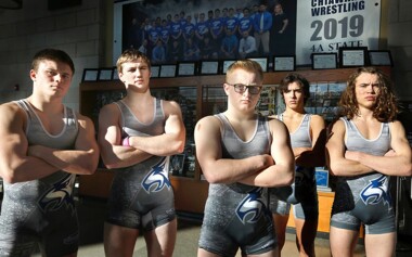 Seniors Riley Cissne, far left, and Robby Vaughn, far right, will join defending state champions Tyson Stover, Isaiah Anderson, middle, and Darion Johnson, from left, on the journey for the championship title