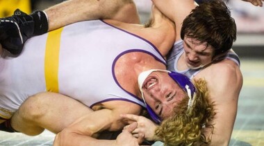 Puyallup’s Isaac Clark wrestles Chiawana’s Tyson Stover