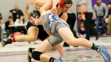 Two boys wrestling