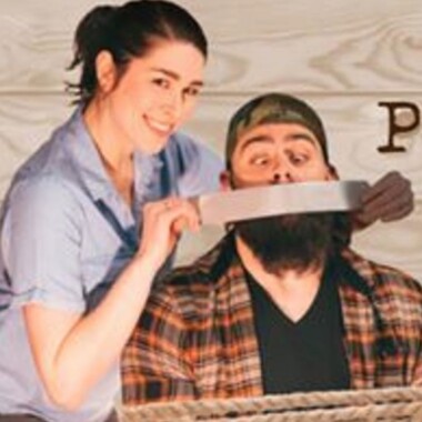 Woman duct taping a mans mouth shut while smiling. The poster for Exit, Pursued By A Bear