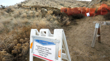 Trail with a sign on it