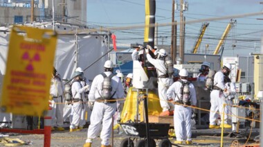 Workers in haz mat suits at the Hanford site