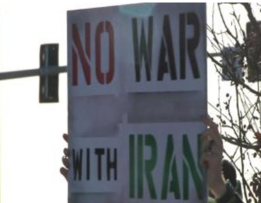 protest sign reading no war with iran