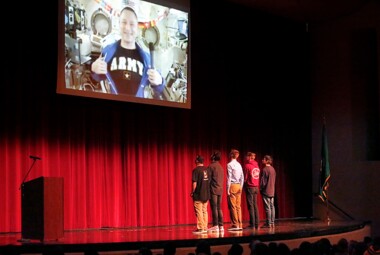 Pedro Garcia of Southridge High, Bryan Edwards of Pasco High, Isaiah Brodaczynski of Richland High, Eli Cooper of Hanford High and Esai Robledo of Richland High being sworn into the Army by astronaut Army Col. Andrew Morgan