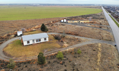 Giant plot of land with one house on it