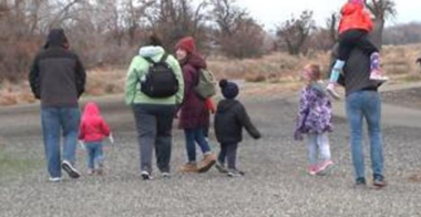 families walking on trail