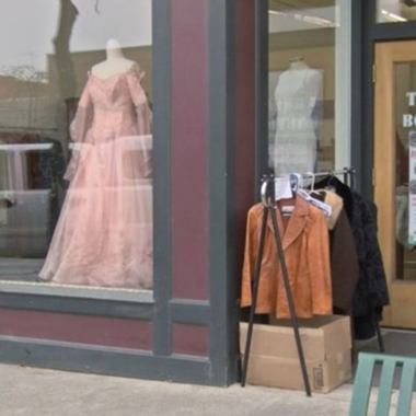 Rack of coats outside of store