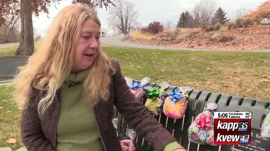 Woman in front of christmas decorated bench