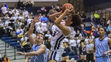 Basketball player going for a jump shot