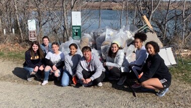 Southridge students with collected trash on Bateman Island