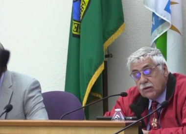 Councilman John Trumbo speaks during a city council meeting