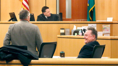 Judge, lawer and former mayor in court room