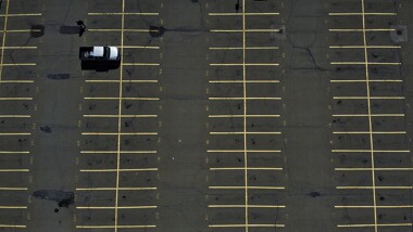 Parking lot with a single truck in it