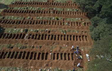 Rows of freshly dug graves