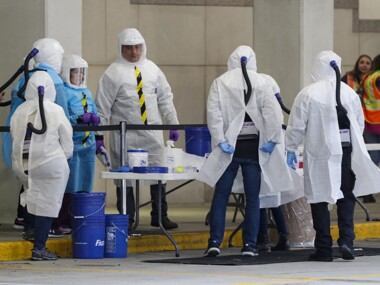 Group of people in Haz-Mat suits