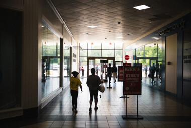 People walking down a mall hallway in South Caorlina